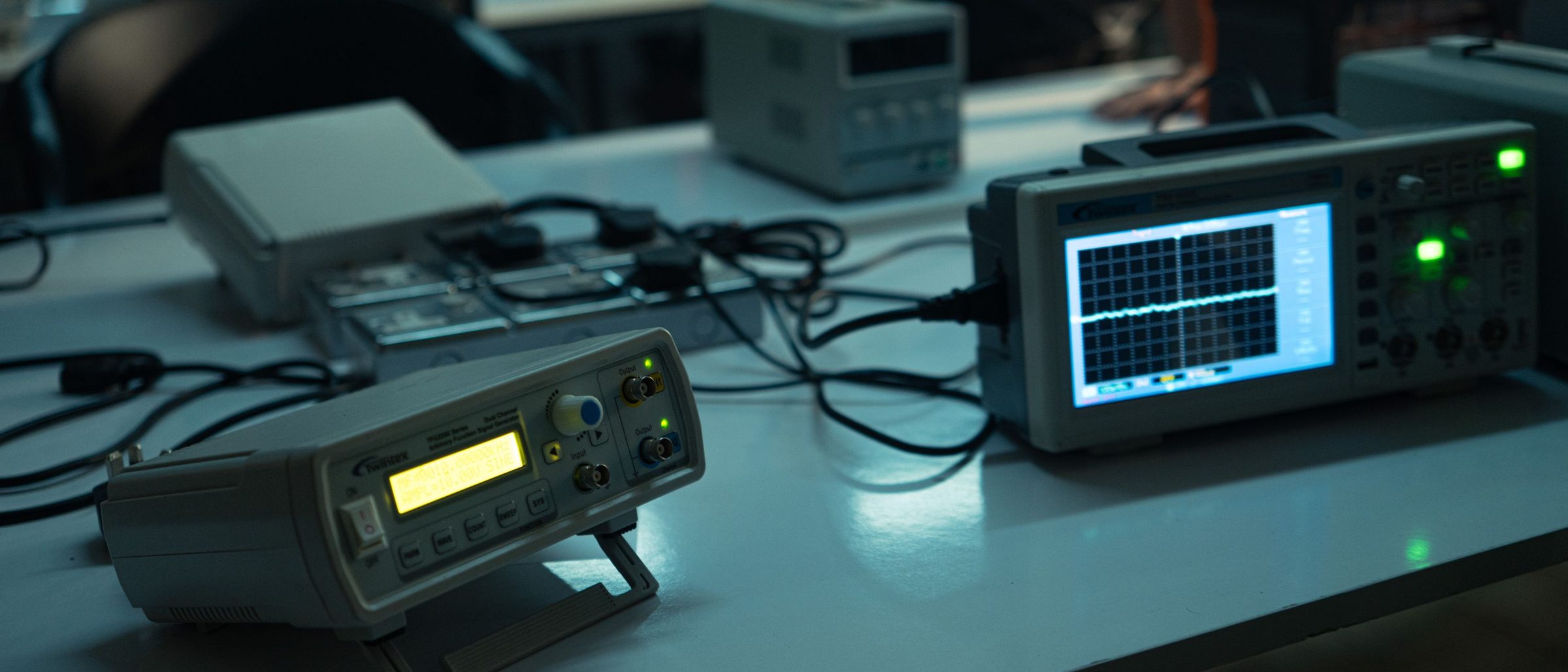 An engineer working at a test bench in a certification laboratory.